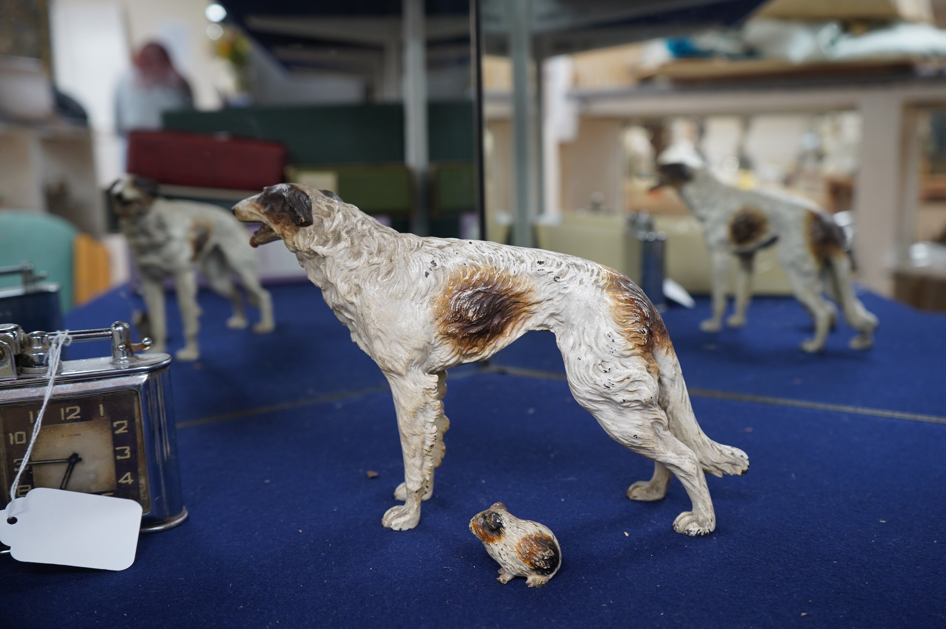 An Austrian cold painted bronze model of a borzoi, 24cm and a guinea pig, 4cm. Condition fair to good, minor chipping to paintwork.